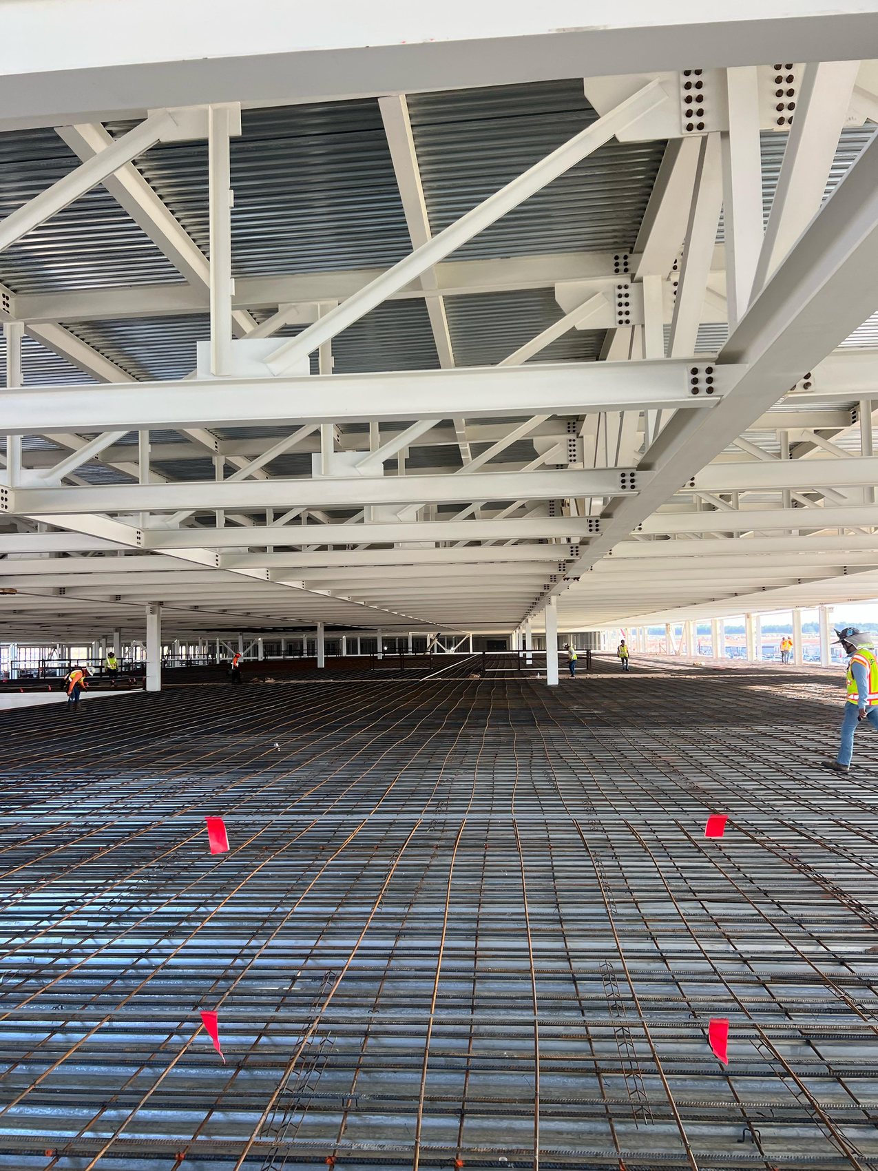 Slab-on-metal-deck reinforcement tied over structural steel framing at Scout, Blythewood SC